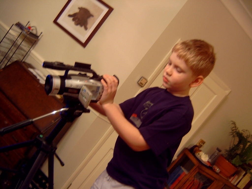 Amruze with a video camera