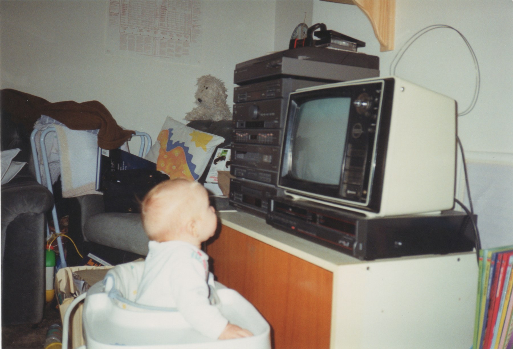 Young Amruze watching television intently